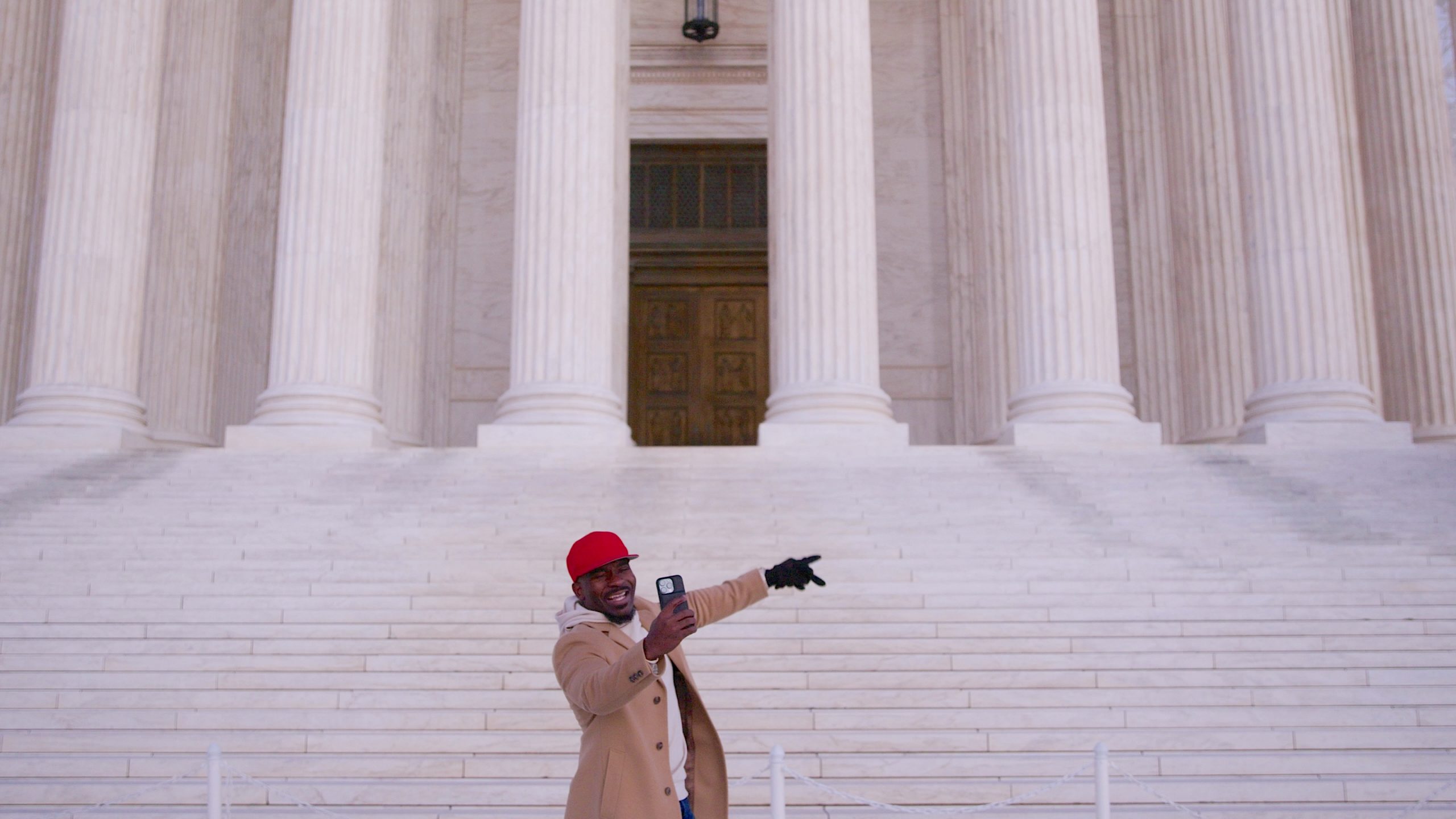 Creator Topher Townsend filming on the steps of the US Supreme Court in TikTok Never Dies