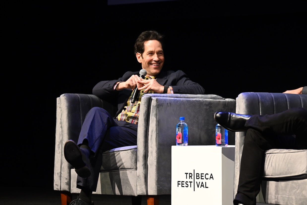 Paul Rudd and Seth Meyers laughing on stage during their conversation at the 2026 Tribeca Festival