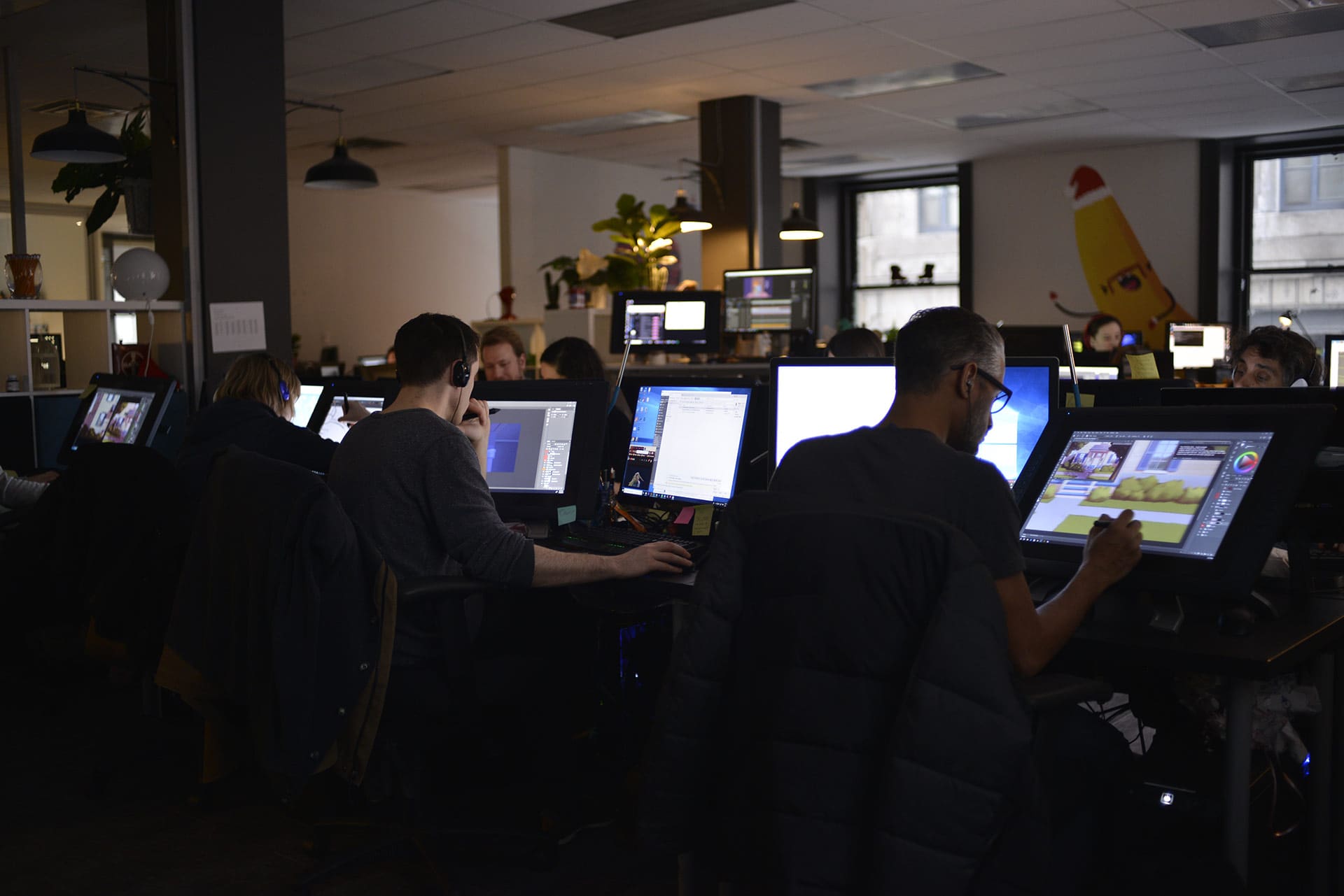 Animators at their desks on the studio floor at Tonic DNA